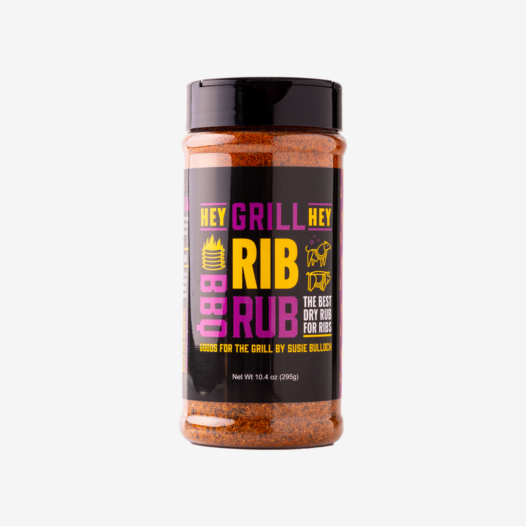A bottle of Hey Grill Hey Rib Rub against a white background.