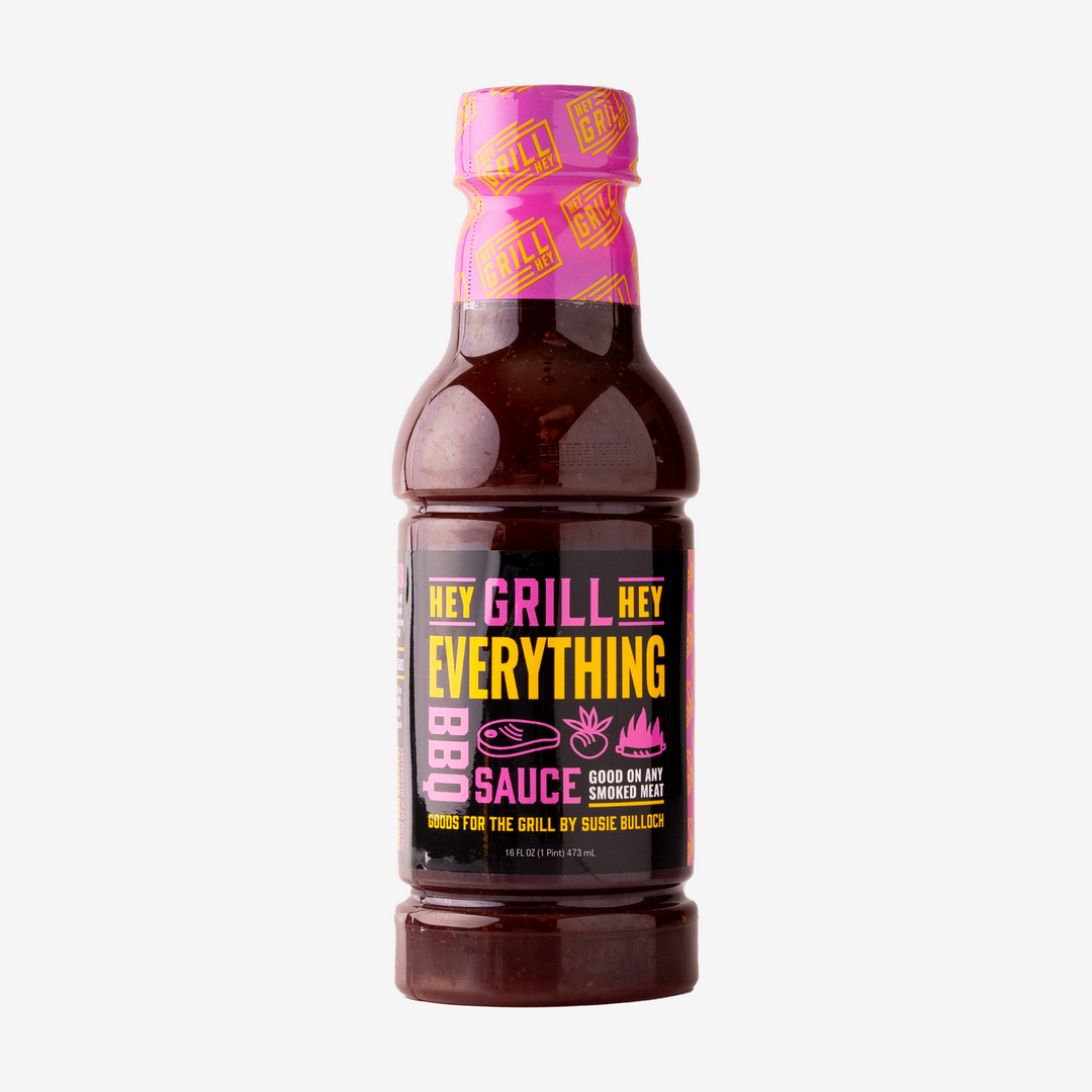 A bottle of Everything Sauce sits on a white background. 