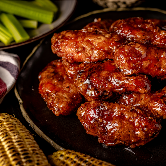 Crispy chicken wings glazed with Sweet Heat BBQ Glaze. 