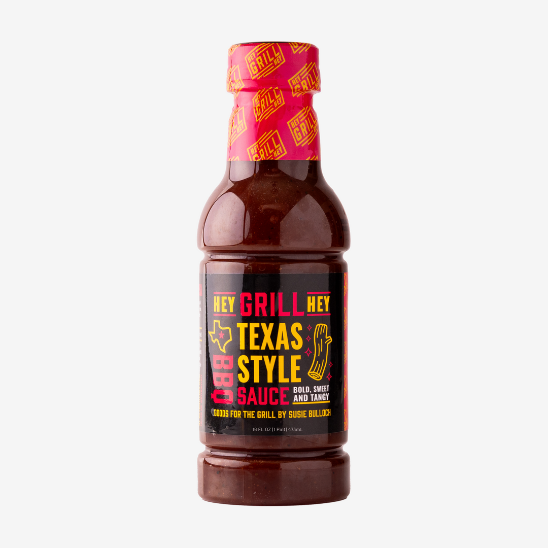 A bottle of Texas Style BBQ Sauce on a white background. 